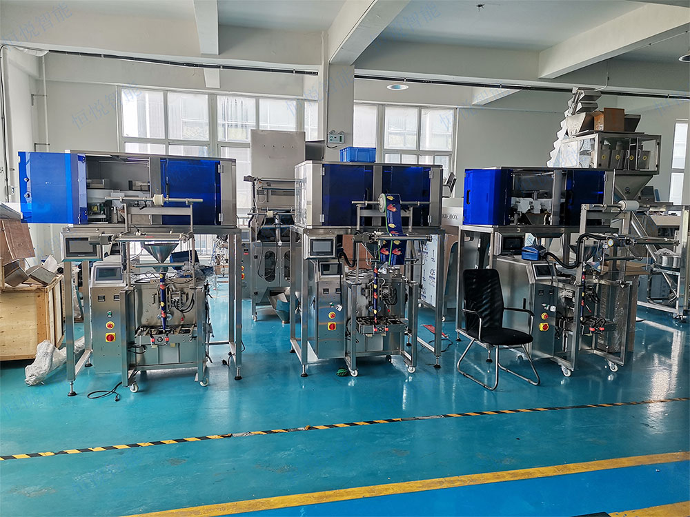 高精度稱(chēng)重式顆粒包裝機(jī).jpg 高精度稱(chēng)重式顆粒包裝機(jī).jpg