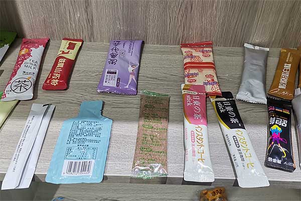 奶茶粉末包裝機可采用三邊封、四邊封、圓角袋型